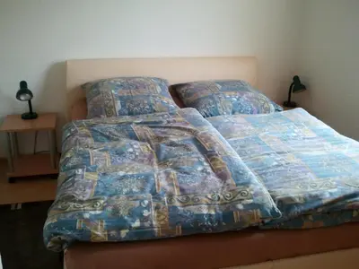 Ein Bett oder Betten in einem Zimmer der Unterkunft Ferienwohnung Sonne-Stadtrand Dresden