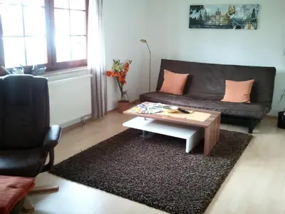 Ein Sitzbereich in der Unterkunft Ferienwohnung Sonne-Stadtrand Dresden