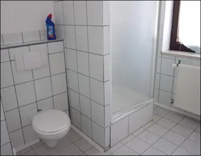 Ein Badezimmer in der Unterkunft Ferienwohnung Kohrener Land