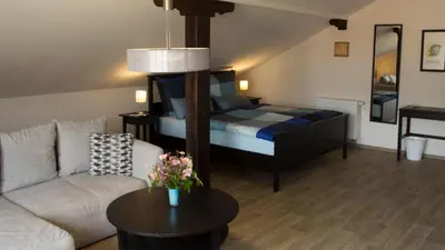 Ein Bett oder Betten in einem Zimmer der Unterkunft Ringelnatz & Lichtwer - Ferienwohnung Wurzen