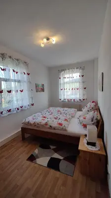 Ein Bett oder Betten in einem Zimmer der Unterkunft Ferienwohnung Familie Schneider