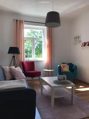 Ein Sitzbereich in der Unterkunft Ferienwohnung am Wald