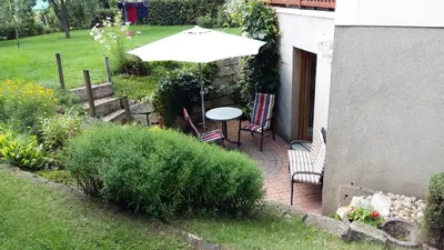 Ein Garten an der Unterkunft Ferienwohnung Törpsch
