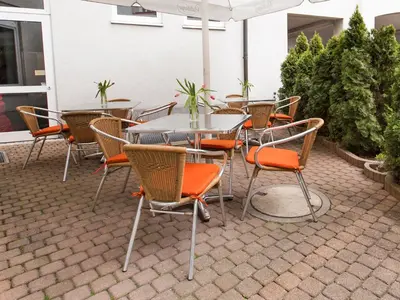 Ein Sitzbereich in der Unterkunft DORMERO Hotel Dresden Airport