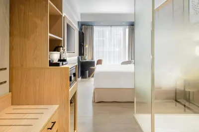Ein Bett oder Betten in einem Zimmer der Unterkunft Barceló Dresden Newa