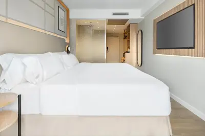 Ein Bett oder Betten in einem Zimmer der Unterkunft Barceló Dresden Newa