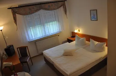 Ein Bett oder Betten in einem Zimmer der Unterkunft Hotel Kirchner