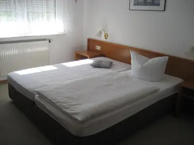 Ein Bett oder Betten in einem Zimmer der Unterkunft Hotel Kirchner