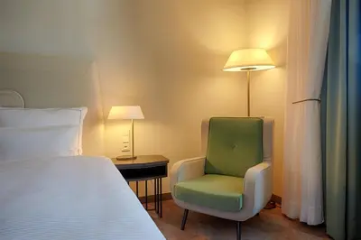 Ein Bett oder Betten in einem Zimmer der Unterkunft Gewandhaus Dresden, Autograph Collection