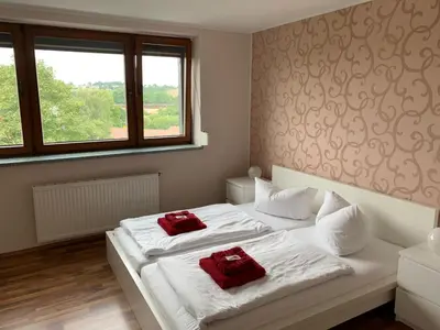 Ein Bett oder Betten in einem Zimmer der Unterkunft Hotel Am Rittergut