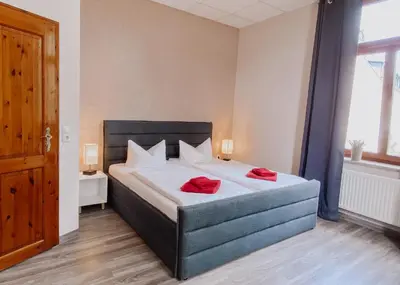 Ein Bett oder Betten in einem Zimmer der Unterkunft Hotel Am Rittergut