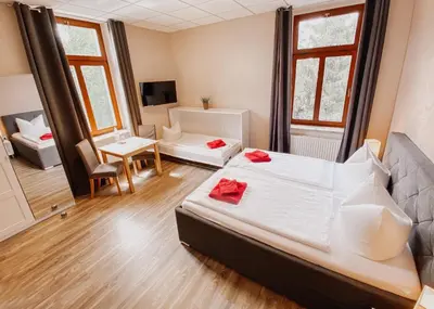 Ein Bett oder Betten in einem Zimmer der Unterkunft Hotel Am Rittergut