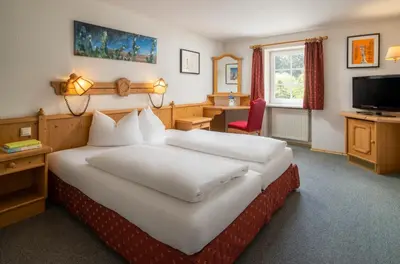 Ein Bett oder Betten in einem Zimmer der Unterkunft Landhotel Altes Zollhaus