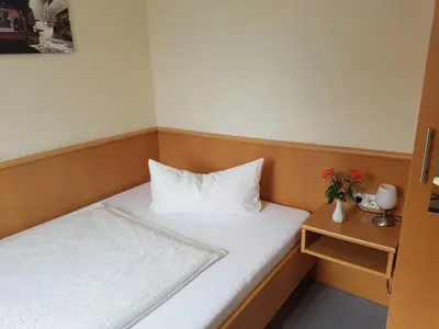 Ein Bett oder Betten in einem Zimmer der Unterkunft Eisenbahnwelten