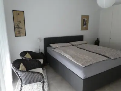 Ein Bett oder Betten in einem Zimmer der Unterkunft großzügige,zetrumsnahe Wohnung