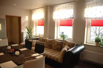 Ein Sitzbereich in der Unterkunft Apartments Stirl