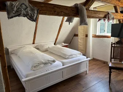 Ein Bett oder Betten in einem Zimmer der Unterkunft Anno 1886 - Knepp-Hänel-Haus