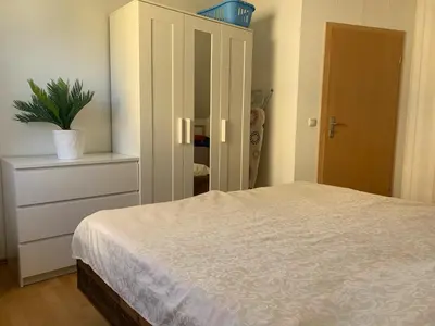 Ein Bett oder Betten in einem Zimmer der Unterkunft Ferienwohnung Braeuer