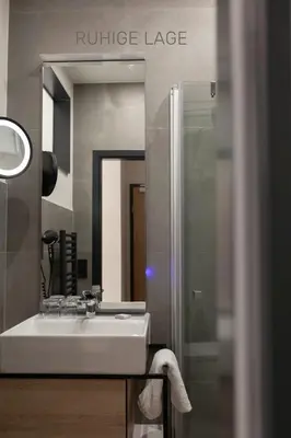 Ein Badezimmer in der Unterkunft Hotel Ross
