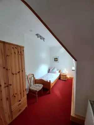 Ein Bett oder Betten in einem Zimmer der Unterkunft Ferienwohnung Elbsommer am Weinberg