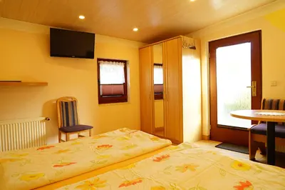 Ein Bett oder Betten in einem Zimmer der Unterkunft Pension Nr. 13 - B&B
