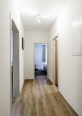 Ein Bett oder Betten in einem Zimmer der Unterkunft Aparthotel Münzgasse An der Frauenkirche
