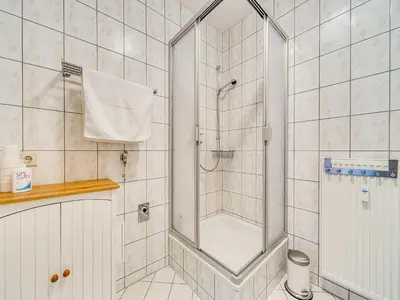 Ein Badezimmer in der Unterkunft Wohnung mit großer Gemeinschaftsterrasse
