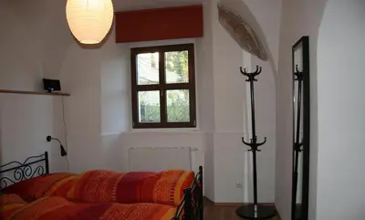 Ein Bett oder Betten in einem Zimmer der Unterkunft Ferienwohnung im Pfarrhaus