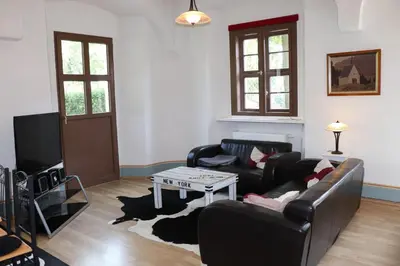 Ein Sitzbereich in der Unterkunft Ferienwohnung im Pfarrhaus