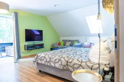Ein Bett oder Betten in einem Zimmer der Unterkunft Hotel Zur Waldhufe