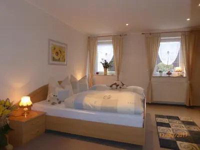 Ein Bett oder Betten in einem Zimmer der Unterkunft Ferienwohnung Flöhatalblick