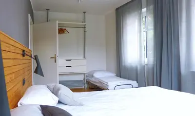 Ein Bett oder Betten in einem Zimmer der Unterkunft FEWO am Markt