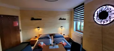 Ein Bett oder Betten in einem Zimmer der Unterkunft Alte Post zu Stetzsch