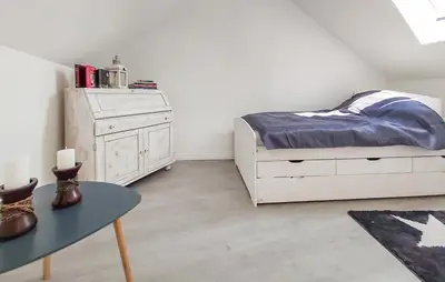 Ein Bett oder Betten in einem Zimmer der Unterkunft Altes Gewölbe mit Sauna und Whirlpool im Außenbereich