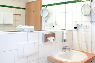 Ein Badezimmer in der Unterkunft Best Western Macrander Hotel Dresden