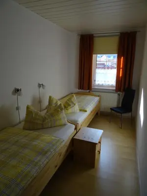 Ein Bett oder Betten in einem Zimmer der Unterkunft Ferienwohnung Bäckerei Förster