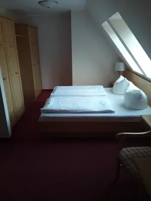 Ein Bett oder Betten in einem Zimmer der Unterkunft Landhotel Keils Gut