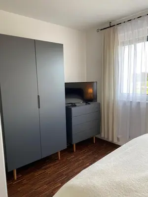 Ein Bett oder Betten in einem Zimmer der Unterkunft Modernes Apartment am Hafen mit Seeblick