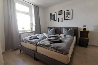 Ein Bett oder Betten in einem Zimmer der Unterkunft Stylish 4ZI Netflix, Kaffeetimer, WIFI, Parken