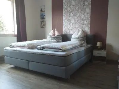 Ein Bett oder Betten in einem Zimmer der Unterkunft Ferienwohnung Radebeul Self Check-in
