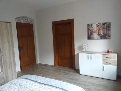 Ein Bett oder Betten in einem Zimmer der Unterkunft Ferienwohnung Radebeul Self Check-in