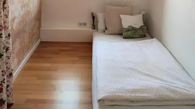 Ein Bett oder Betten in einem Zimmer der Unterkunft Ferienhaus Erna