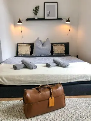 Ein Bett oder Betten in einem Zimmer der Unterkunft B OUR GUEST at NEW Vintage Chic Apartment
