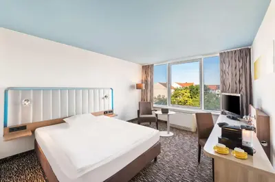Ein Bett oder Betten in einem Zimmer der Unterkunft Best Western Plus Hotel Dresden City