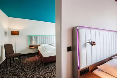 Ein Bett oder Betten in einem Zimmer der Unterkunft Best Western Plus Hotel Dresden City