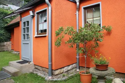 Ein Garten an der Unterkunft Ferienhaus Franz - an der Elbe, mit großem Garten