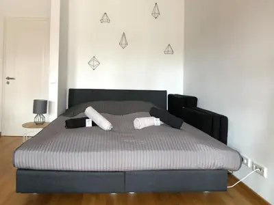 Ein Bett oder Betten in einem Zimmer der Unterkunft Zentrales Studio an der Frauenkirche