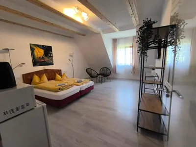Ein Bett oder Betten in einem Zimmer der Unterkunft Rittergut Dröschkau