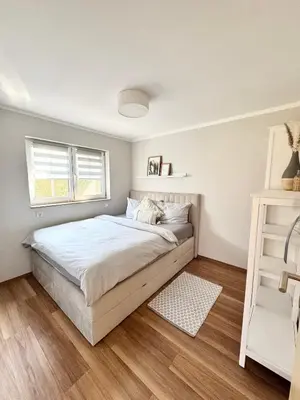 Ein Bett oder Betten in einem Zimmer der Unterkunft Ferienhaus Lars