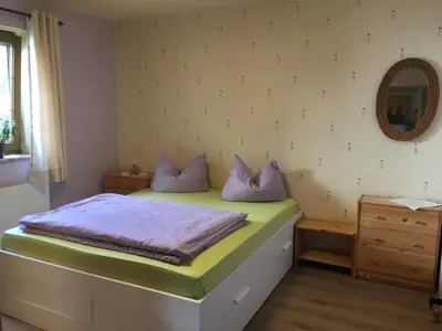 Ein Bett oder Betten in einem Zimmer der Unterkunft Schlossblick Lauenstein